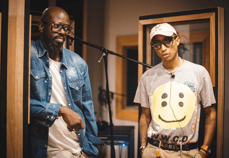 Black Coffee and Pharell Williams in music studio