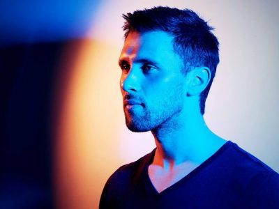 Danny Howard cast in blue light