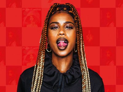 neo-soul artist IAMDDB against red background