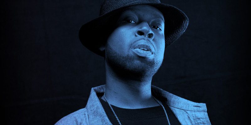 J Dilla wearing hat with blue wash over photo