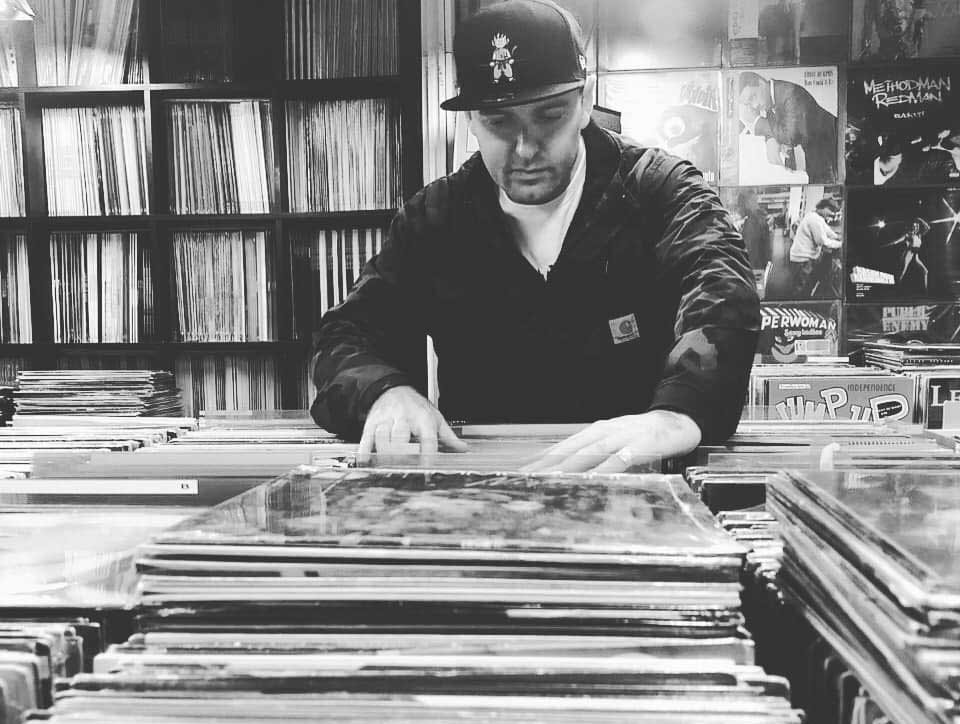 Lobito Brigante digging through records