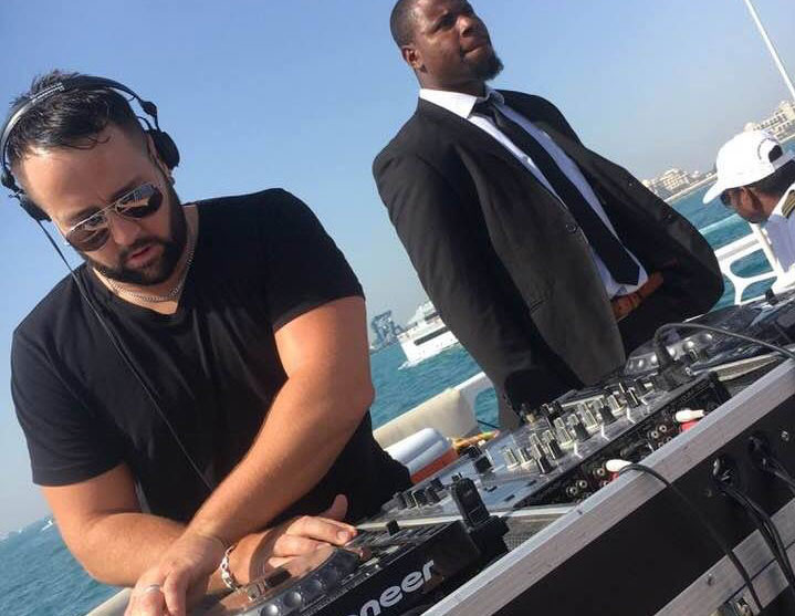 DJ Rossi DJing on a yacht