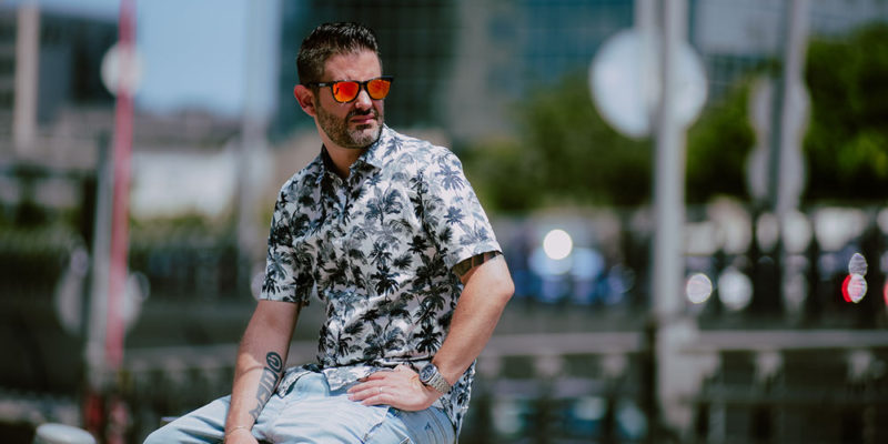 Sebastien Léger wearing sunglasses and loud shirt