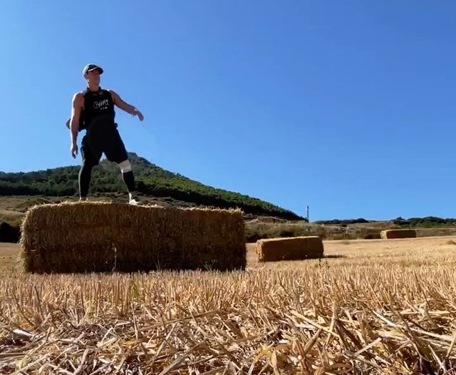 Ben Echo on hay bale