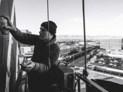 Shepard Fairey painting outdoor mural