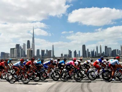UAE Tour cyclists against Dubai skyline