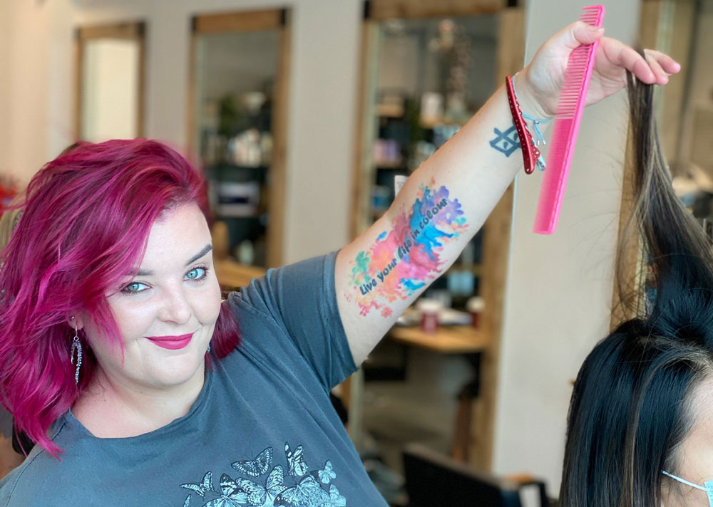 Headkase co-founder Ali Keigh showing off tattoo in arm