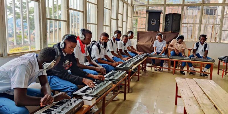 Students with Behringer synths in Rwanda