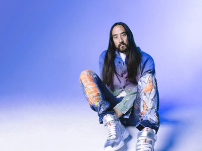 Steve Aoki on purple background