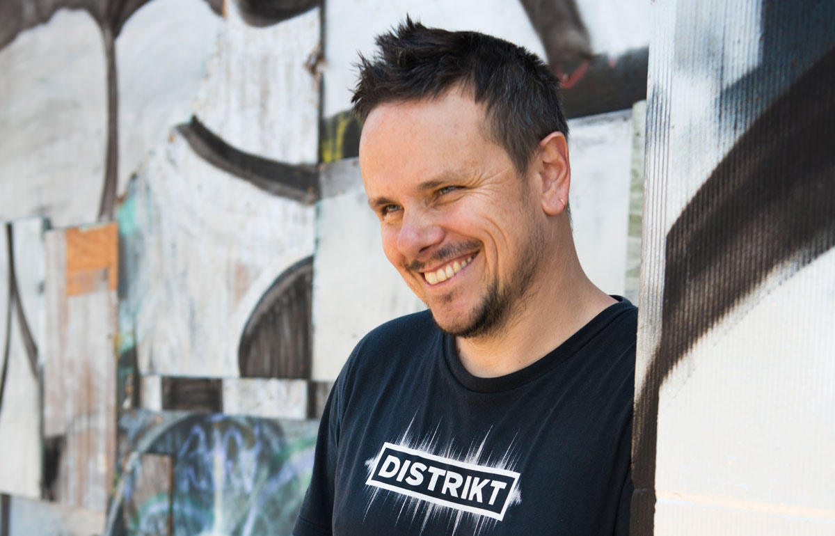 Simon Shackleton wearing Distrikt t-shirt t