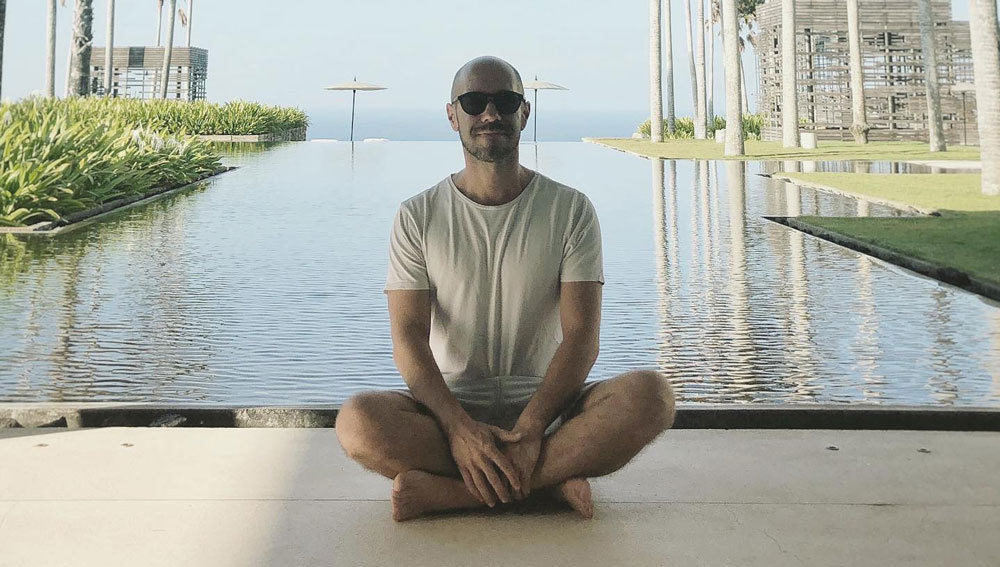 Martin Roth sitting in yoga position